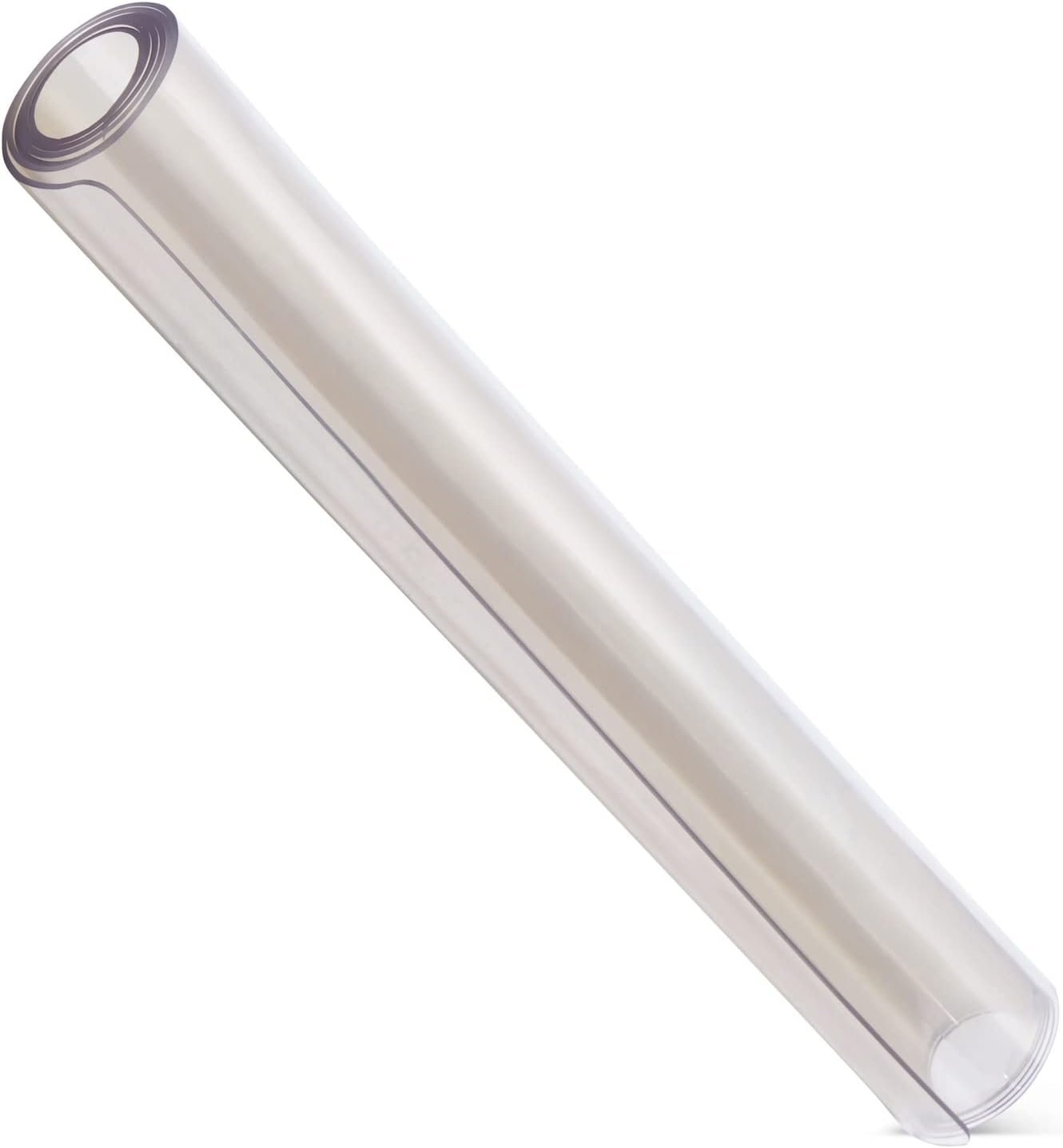 Frosted transparent desk mat rolled up showing its clear translucent material