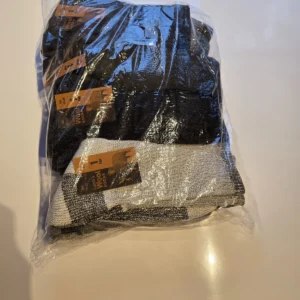 Pack of 5 pairs lambs wool blend socks in black and grey colors in clear plastic packaging