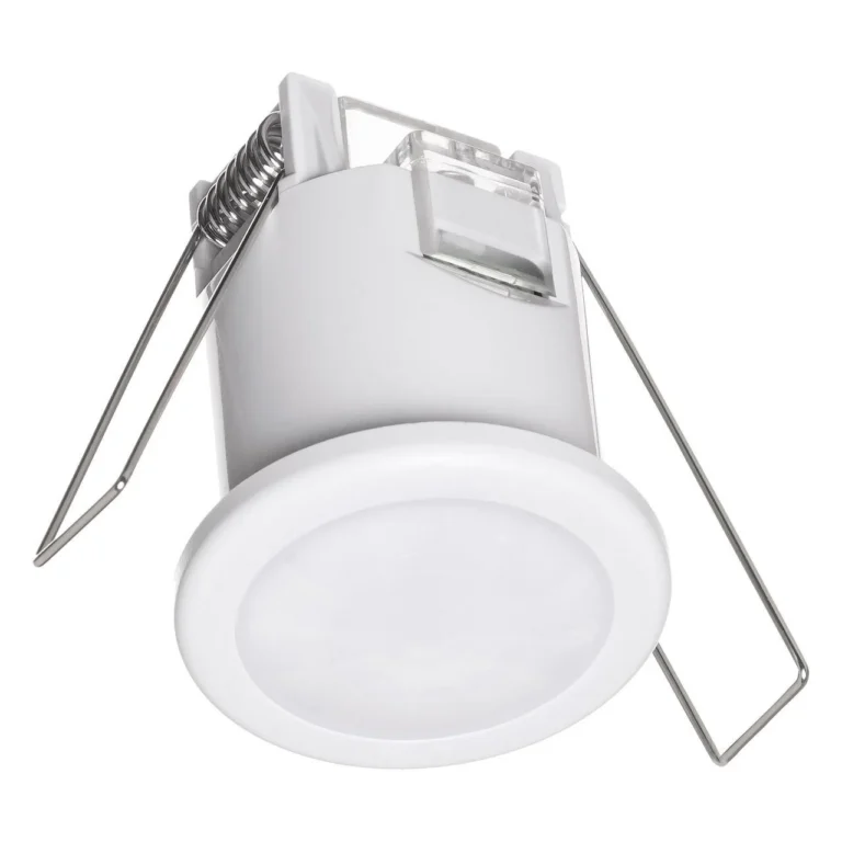 white circular light fixture with metal clips and visible spring mechanism