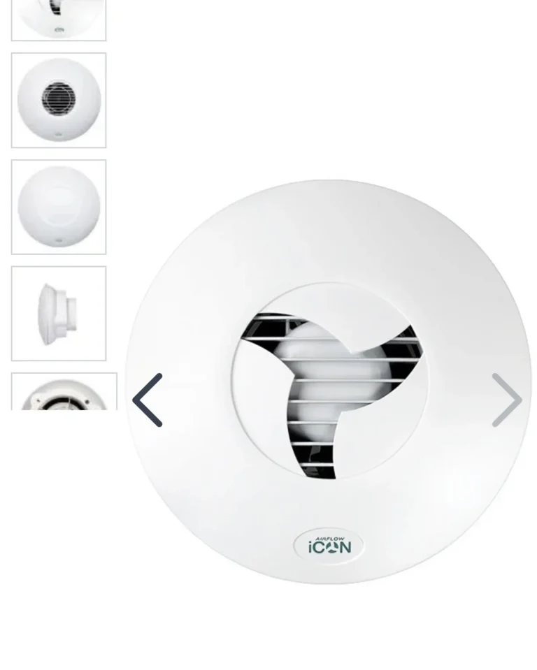 white circular plastic vent with grid pattern and three curved blades